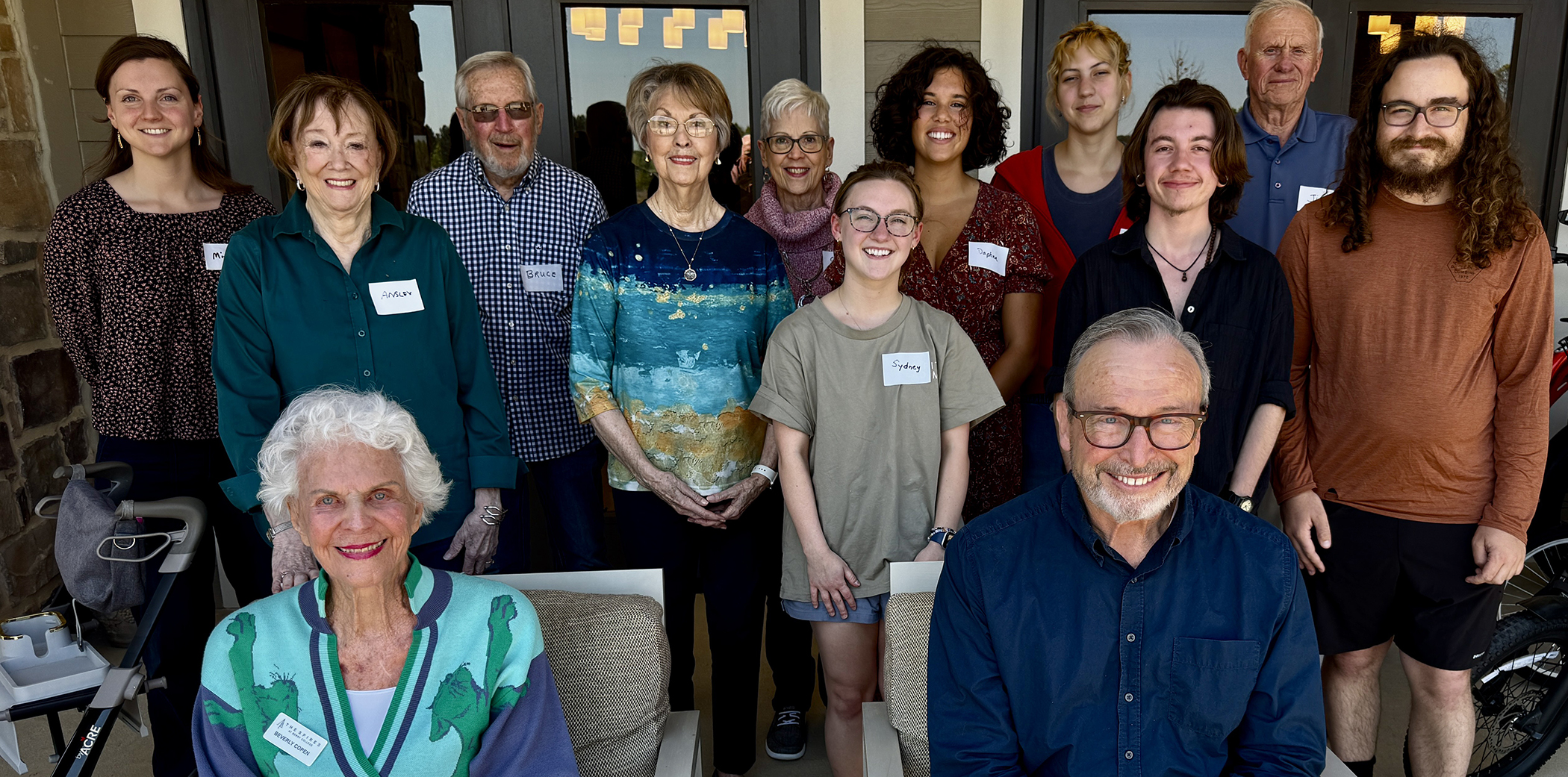 Students and Spires residents pose for a photo