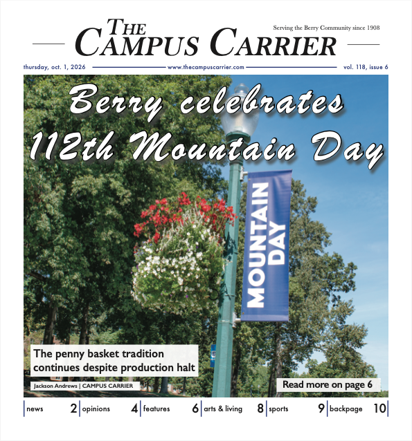 The Campus Carrier newspaper headline celebrating Berry's 112th Mountain Day, with a blue banner reading 'Mountain Day' hanging from a lamppost surrounded by greenery.